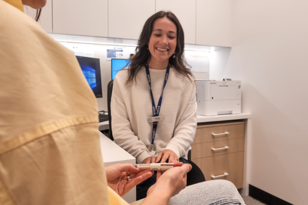 Nurse megan smiling with Paris pen